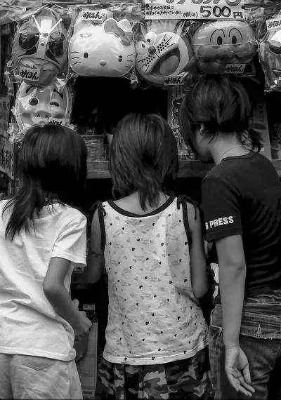 three girls in sweet shop