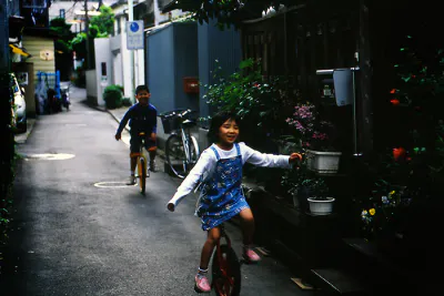 Kids riding unicycle