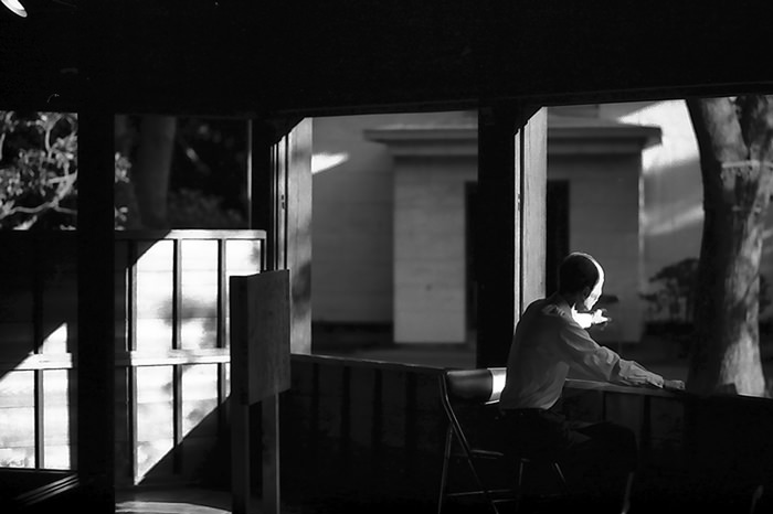 Man sitting by window