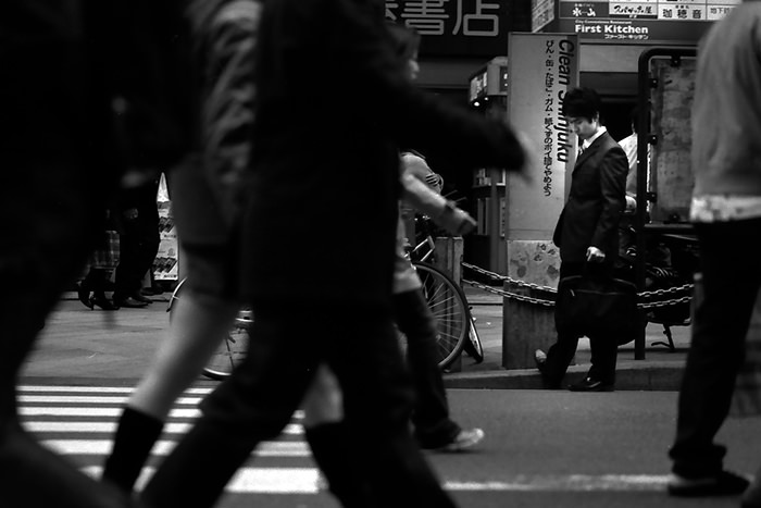 Businessman by roadside