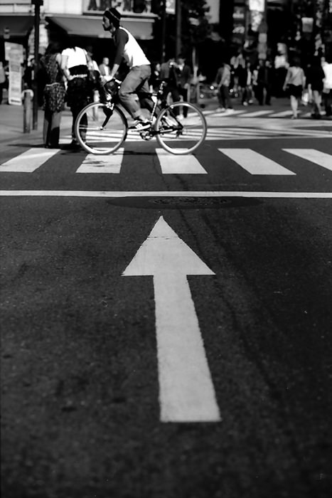 Bicycle running ahead arrow