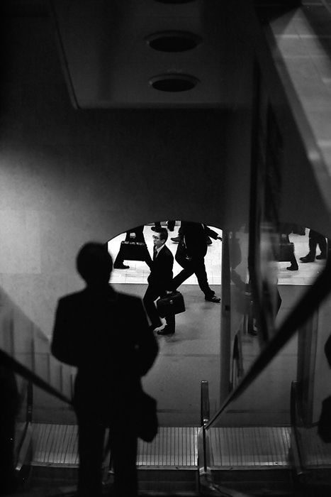 Silhouette on escalator