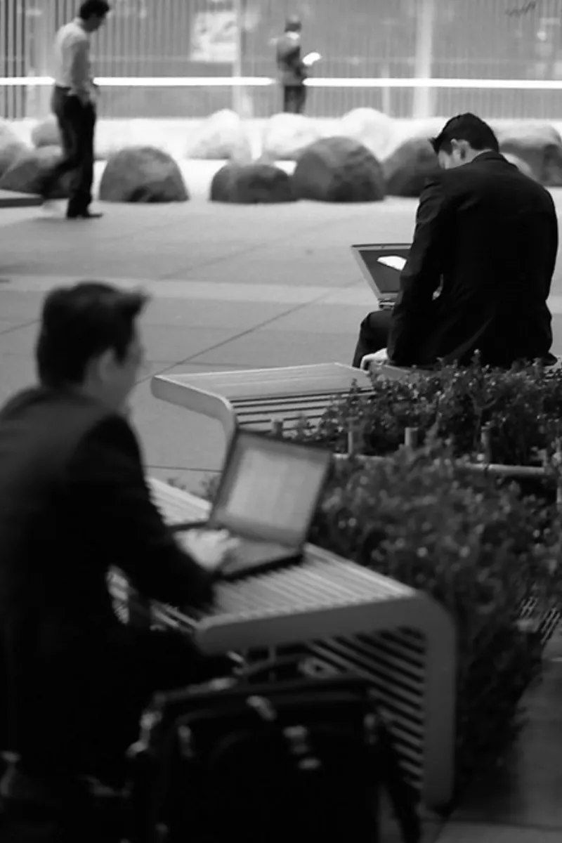 Businessmen working outside