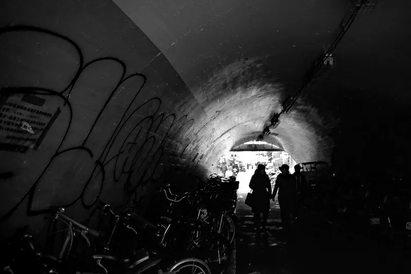 Silhouettes in tunnel