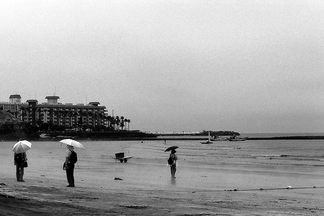 Three umbrellas on beach