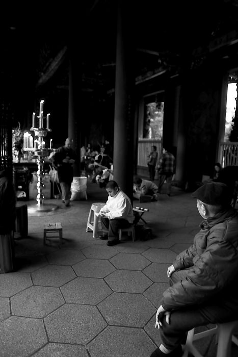 Old man sitting in precinct