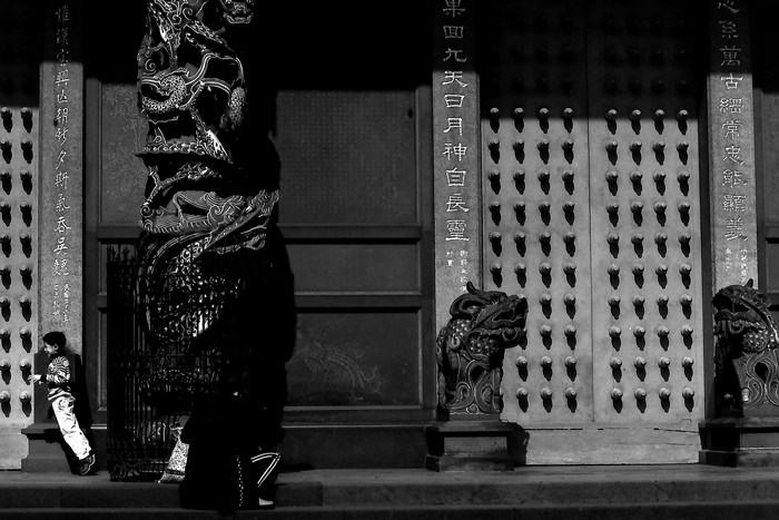 Boy in front of door