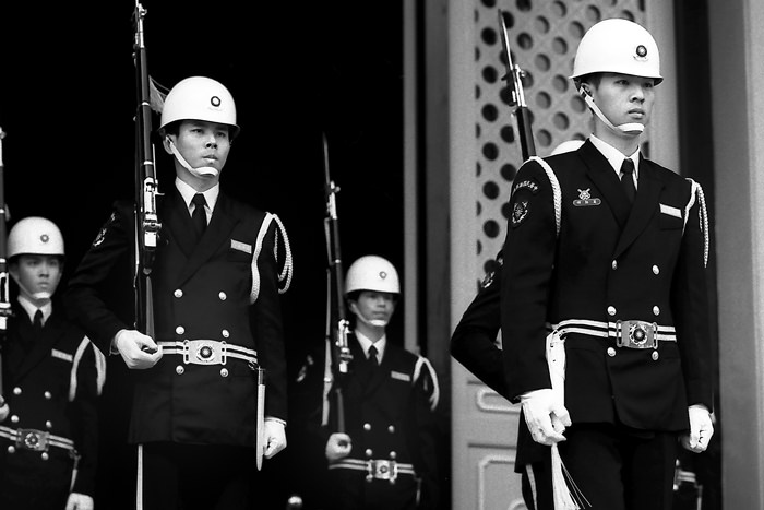 Guardsmen wearing firm face