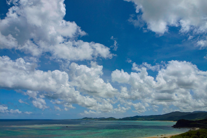 Clouds above blue ocean