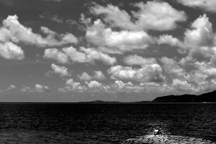 Small figure on seawall