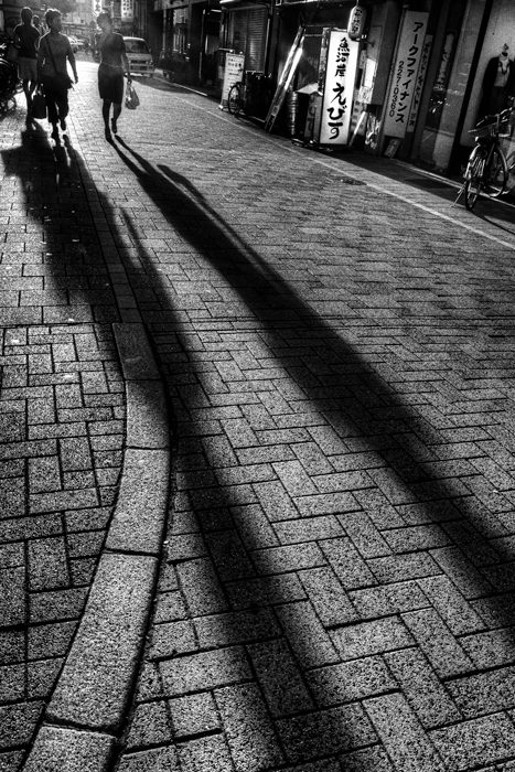 Long shadow on ground