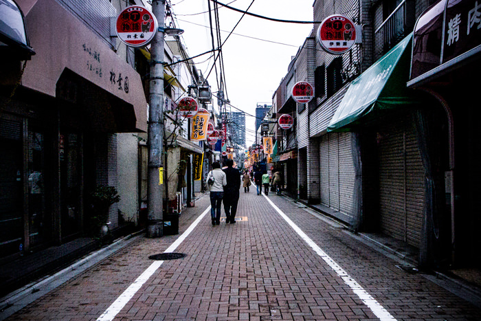 Couple walking shopping street