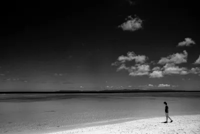 Woman walking beach