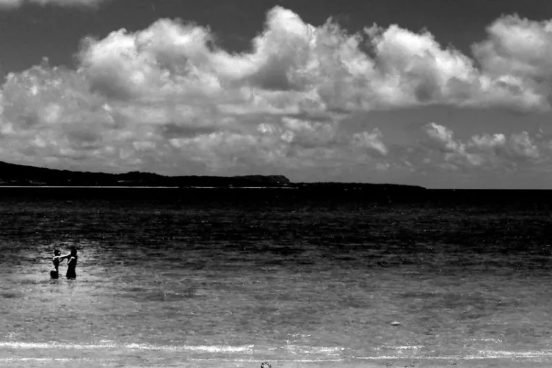 two playing in shoal in Yarahama beach