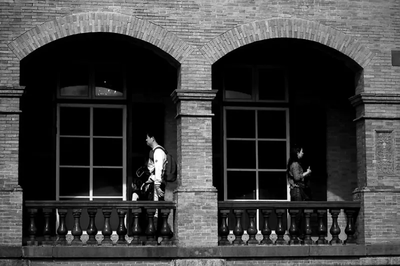 Man and woman in corridor