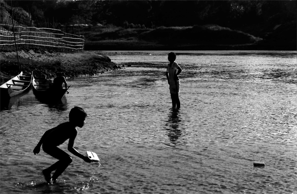 Silhouettes In The Nam Khan River (Laos)