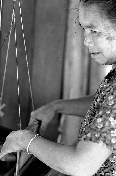 Female Weaver Was Working (Laos)
