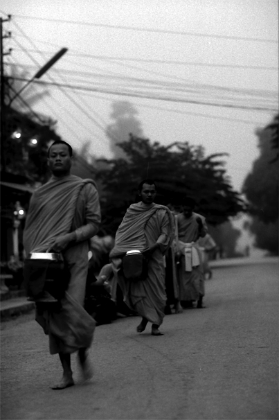 Monks Walking For The Morning Alms (Laos)