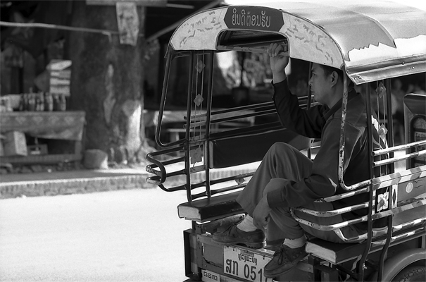 Man On The Seat Of A Jumbo (Laos)