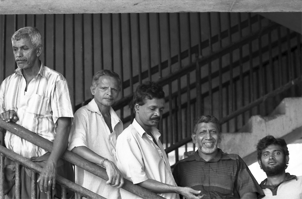 Men Standing At The Saircase (Sri Lanka)