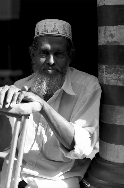 Man Resting In Jami Ul-Alfar Mosque (Sri Lanka)