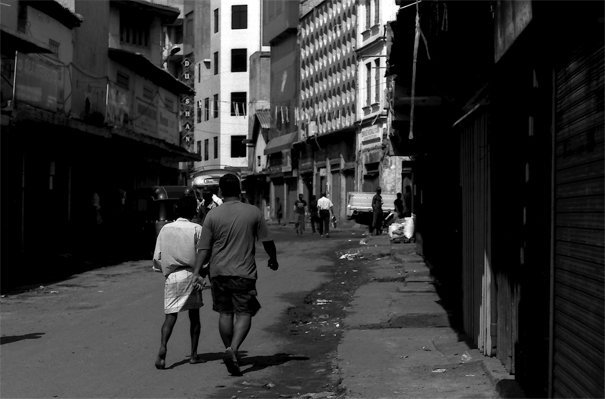 Men Walking The Street In Pettah (Sri Lanka)