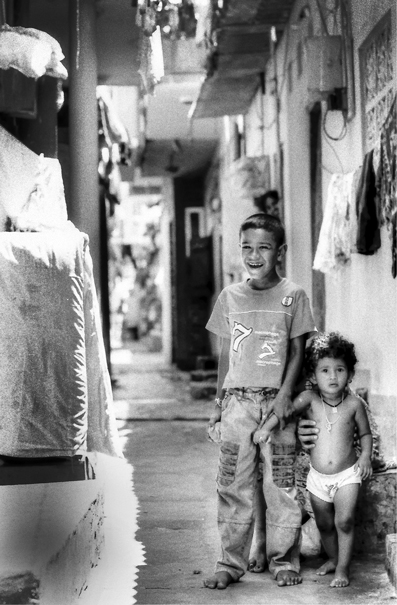 Laughing Boy And Frightened Toddler (Sri Lanka)