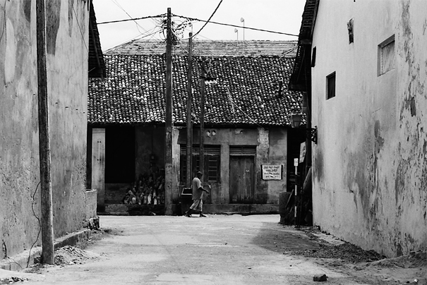 Man Walking Alone In The Old City (Sri Lanka)