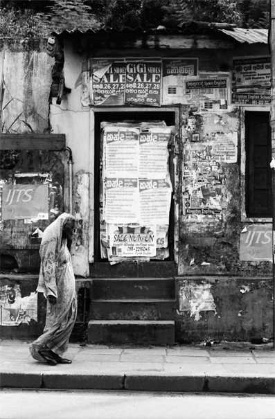 Walking Saree And Boarded-up Entrance (Sri Lanka)