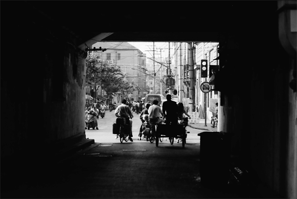 Bicycles At The Tunnel Exit (China)