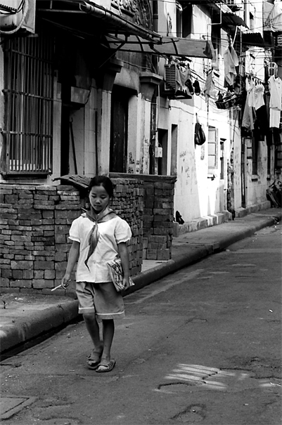 Girl walking lane with school uniform