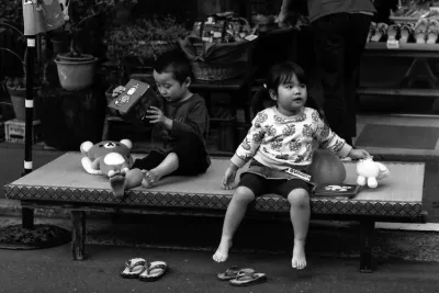 Two kids on bench