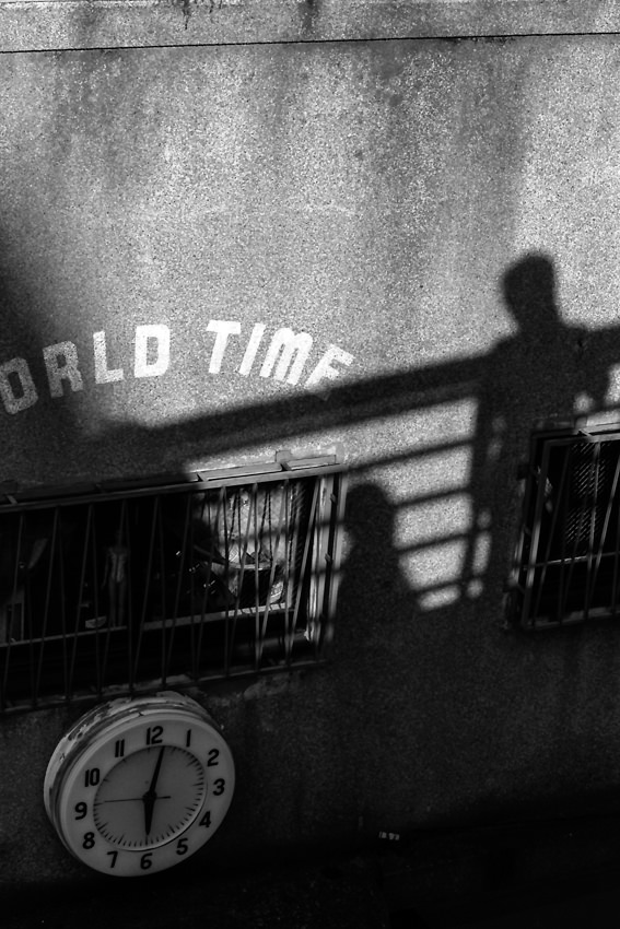 Shadows and clock on the wall