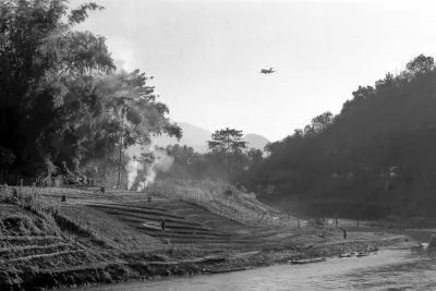 Airplane appearing over Luang Prabang