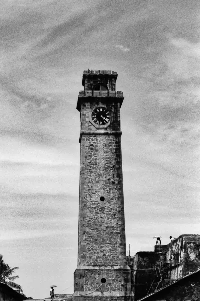 Darkish clock tower rising in Galle