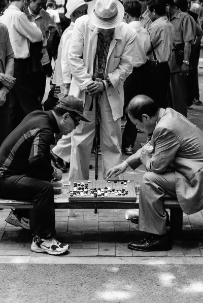 Men Playing Go in park