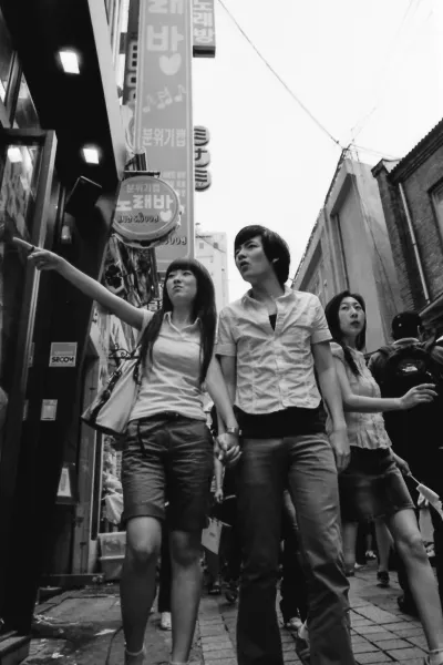 Young couple walking hand in hand
