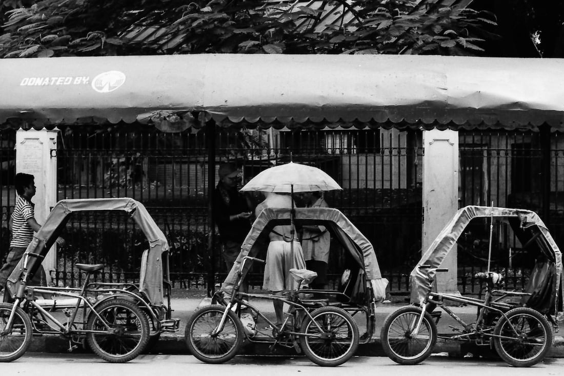 Tricycles parked in taxi-stand-like place