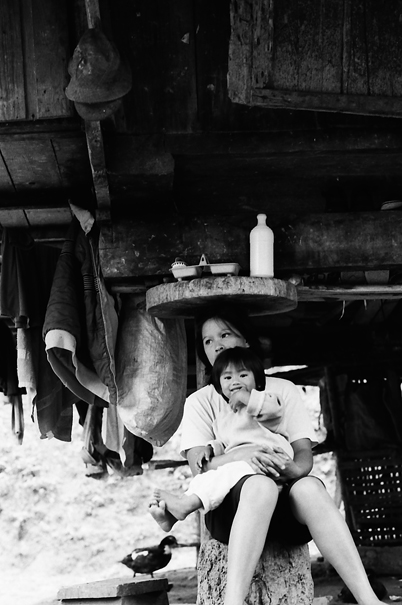 Mother And Girl Under The Rat Guard (Philippines)