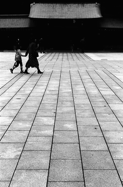 Figures Walking The Precinct (Tokyo)