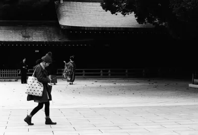 Girl heading for prayer hall in Meiji Jingu