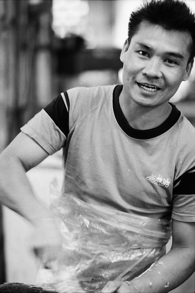Man Making A Motion With His Hand (Malaysia)