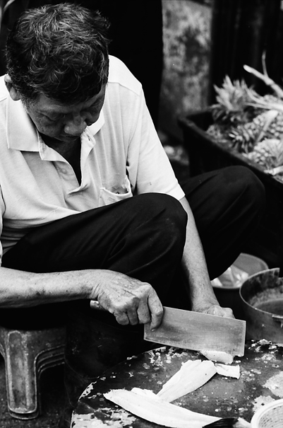 Man Was Cutting A Fish (Malaysia)