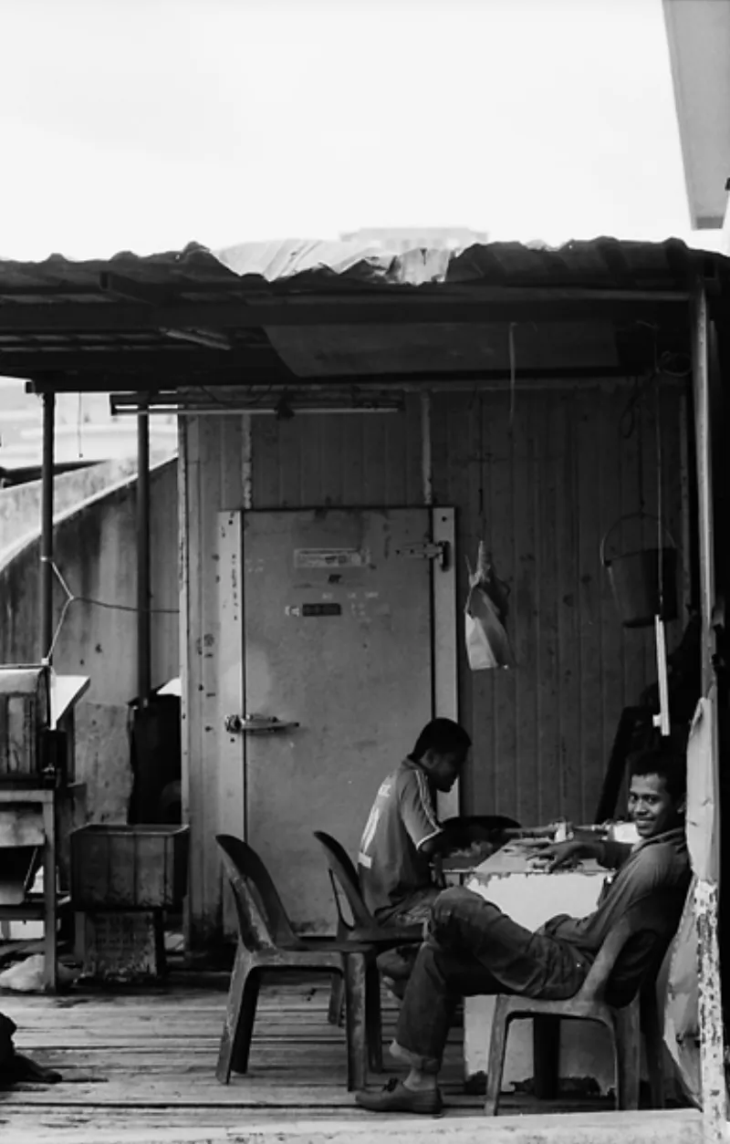 Men resting at backdoor