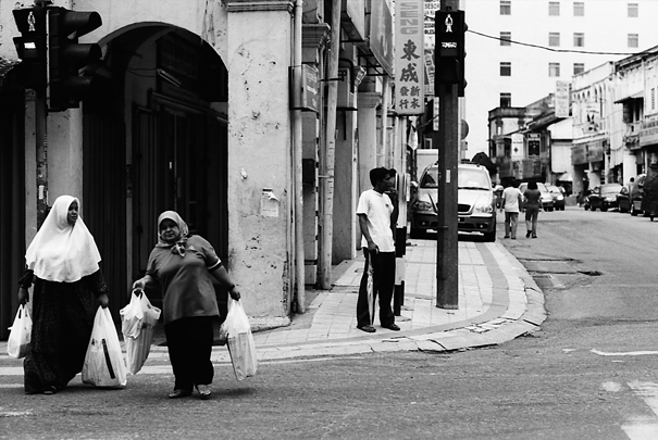 Chubby women crossing street