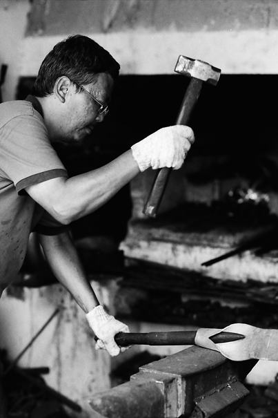 Man Banging Down The Hammer (Malaysia)