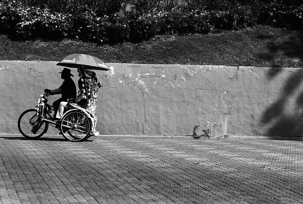 Trishaw Goes With An Umbrella (Malaysia)