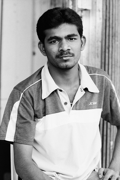 Man Straightening Up His Back (Malaysia)