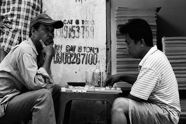 Men playing Chinese chess