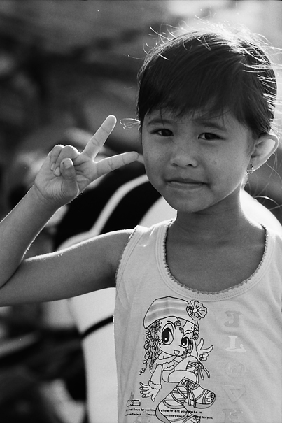 Girl Throwing A Deuce (Vietnam)